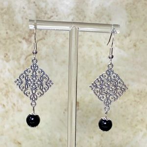 Silver tone earrings with obsidian beads